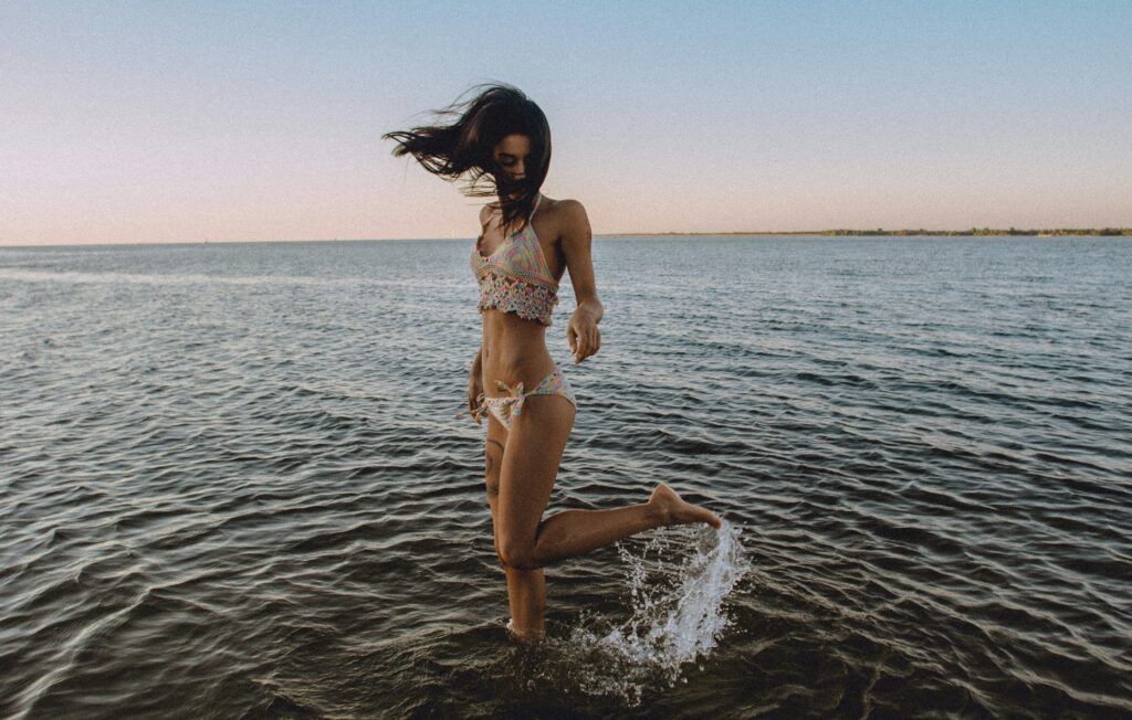 dancing girl at sea side